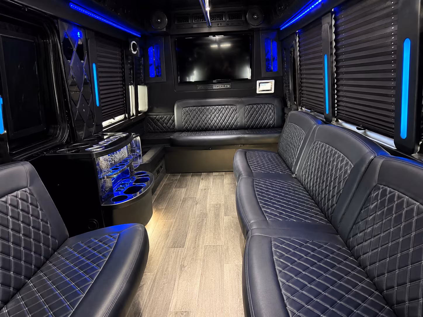 Passenger seating aboard a party bus rental serving San Diego